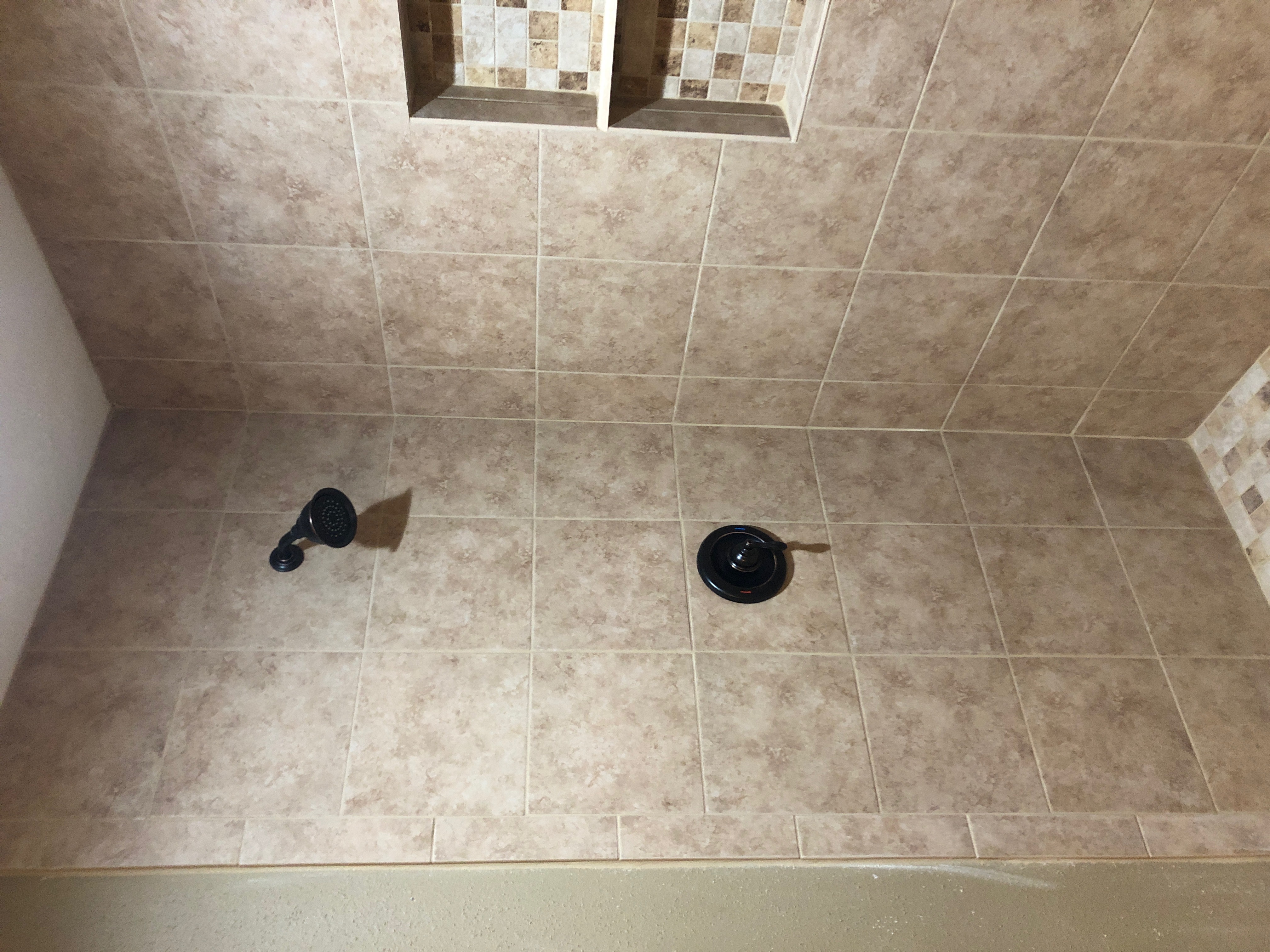 An interior remodel featuring a custom shower